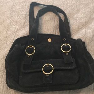 Ginger Michelle’s black suede purse